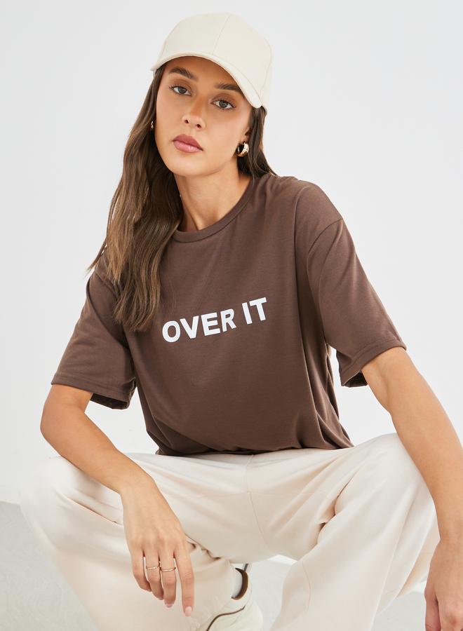 Styli Women Brown Slogan Print Oversized T-Shirt - Image 3